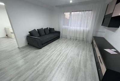 Apartament cu 3 camere semidecomandat, mobilat în Central