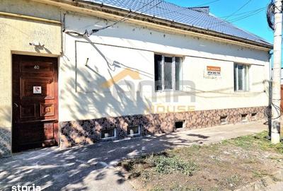 Casă cu 5 camere cu Teren 100 Mp în Drăgășani