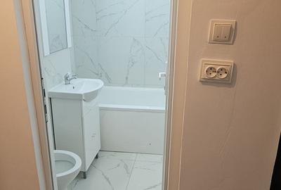 Garsonieră decomandată în Central - 7
