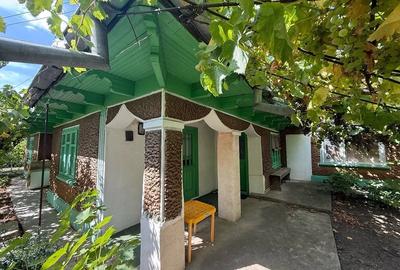 Casă cu Teren 1300 Mp în Cuca