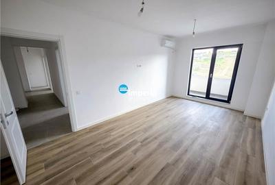 Apartament cu 2 camere decomandat în Bucium - 2