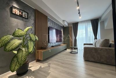 Apartament cu 3 camere semidecomandat, mobilat în Baciu