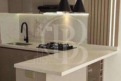 Apartament cu 3 camere decomandat în Titan