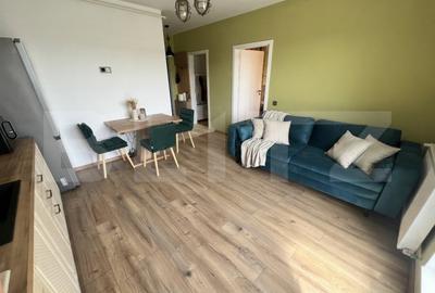 Apartament cu 2 camere semidecomandat, mobilat în Chinteni