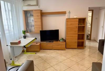 Apartament cu 2 camere semidecomandat, mobilat în 1 Mai