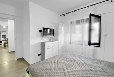 Apartament cu 2 camere semidecomandat, mobilat în Tractorul - 4
