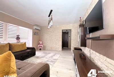 Apartament cu 3 camere semidecomandat în Confecții