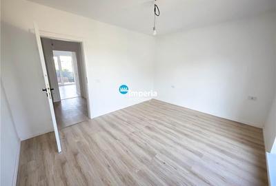 Apartament cu 3 camere decomandat în Bucium - 10