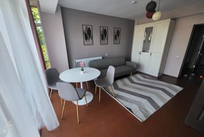 Apartament cu 2 camere semidecomandat, mobilat în Bucium