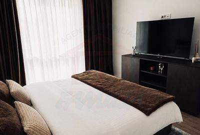 Apartament cu 2 camere semidecomandat, mobilat în Central