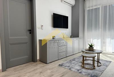 Apartament cu 2 camere semidecomandat, mobilat în UTA