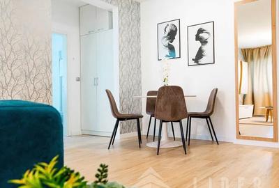 Apartament cu 2 camere semidecomandat, mobilat în Central