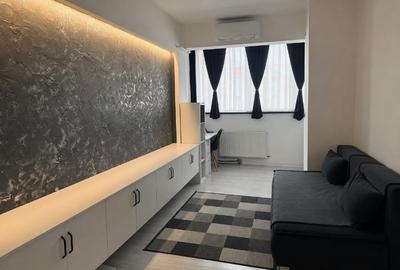 Apartament cu 2 camere semidecomandat, mobilat în UTA