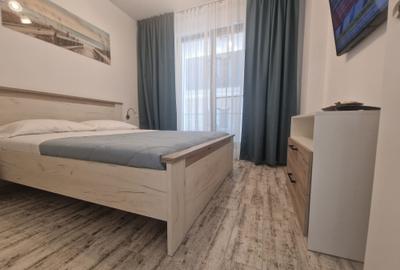 Apartament cu 2 camere semidecomandat, mobilat în Central