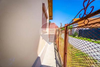 Casă cu Teren 565 Mp în Zizin