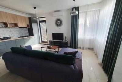 Apartament cu 2 camere semidecomandat, mobilat în Central