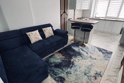 Apartament cu 2 camere semidecomandat, mobilat în Central