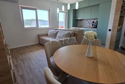 Apartament cu 3 camere semidecomandat, mobilat în Baciu