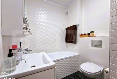 Apartament cu 3 camere semidecomandat în Sânnicoară