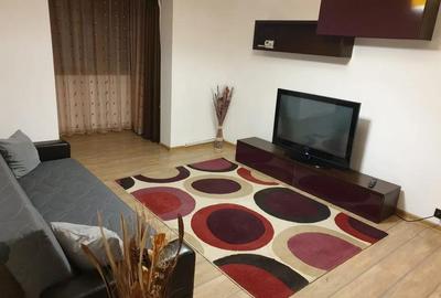 Apartament cu 2 camere semidecomandat, mobilat în Podu Roș
