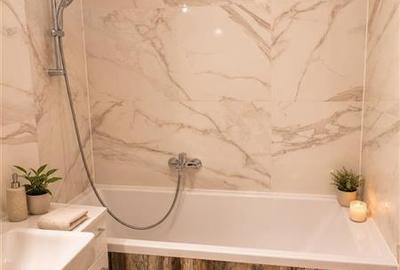 Apartament cu 2 camere decomandat, mobilat în Tractorul - 10