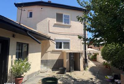 Casă cu 4 camere în Titulescu