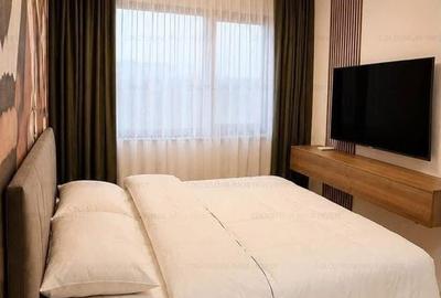 Apartament cu 3 camere decomandat în Tractorul