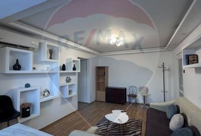 Apartament cu 2 camere semidecomandat, mobilat în Podul de Piatră