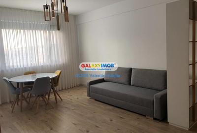 Apartament cu 3 camere semidecomandat, mobilat în Băneasa