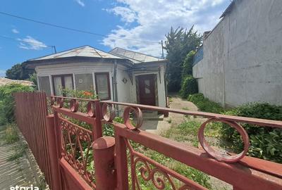 Casă cu 2 camere cu Teren 1258 Mp în Central