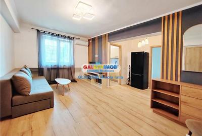 Apartament cu 3 camere semidecomandat, mobilat în Central