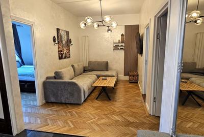 Apartament cu 4 camere semidecomandat, mobilat în P-ța Universității - 1