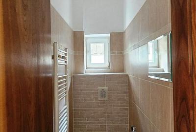 Apartament cu 5 camere în Romană
