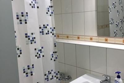 Garsonieră decomandată în Central - 7