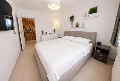 Apartament cu 4 camere decomandat în Tractorul - 11