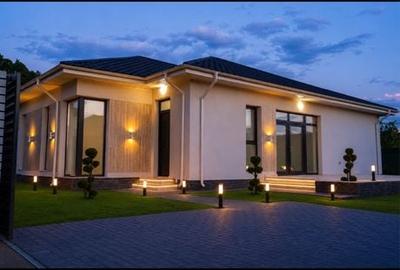 Casă cu 4 camere cu Teren 500 Mp în Bucov