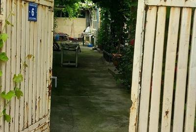 Casă cu Teren 1000 Mp în Central