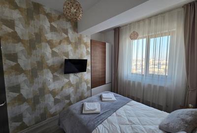 Apartament cu 2 camere semidecomandat, mobilat în Podu Roș