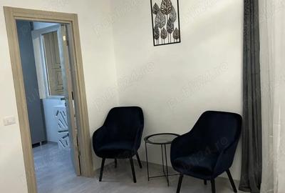 Garsonieră decomandată în Central - 7