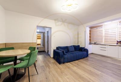 Apartament cu 3 camere semidecomandat, mobilat în Calea București - 3