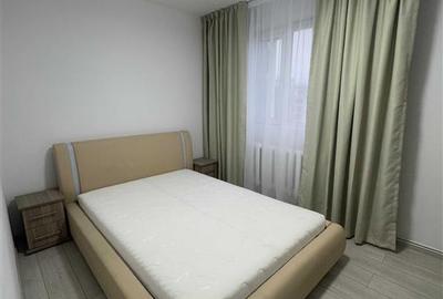 Apartament cu 2 camere semidecomandat, mobilat în Podu Roș