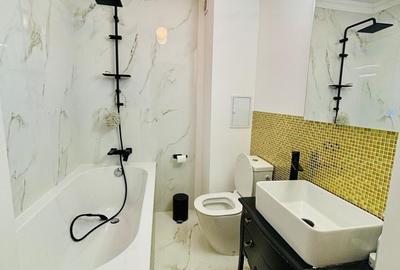 Apartament cu 3 camere semidecomandat în Muncii