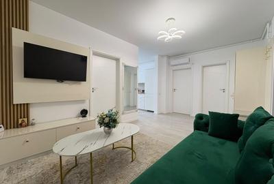 Apartament cu 3 camere semidecomandat, mobilat în Central