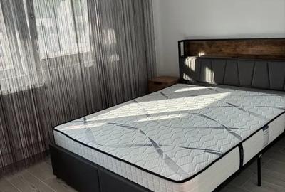 Apartament cu 2 camere semidecomandat, mobilat în Central