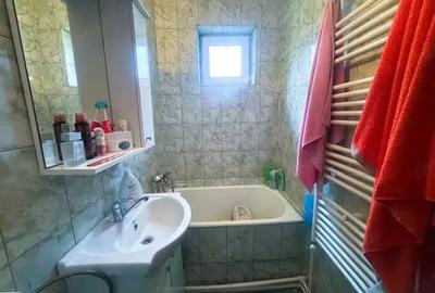 Apartament cu 4 camere decomandat în Drăgănești-Olt - 13