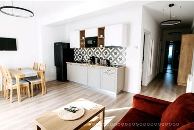 Apartament cu 2 camere semidecomandat, mobilat în Borhanci