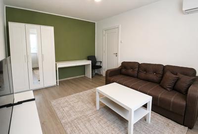 Apartament cu 2 camere semidecomandat, mobilat în Podu Roș