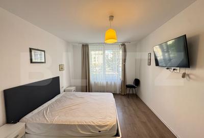 Apartament cu 2 camere semidecomandat, mobilat în Tractorul