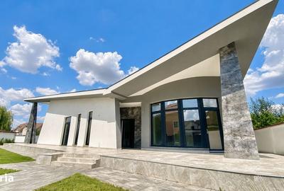 Casă cu 4 camere decomandat în Sânmartin