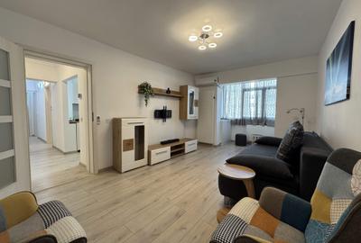 Apartament cu 3 camere decomandat, mobilat în